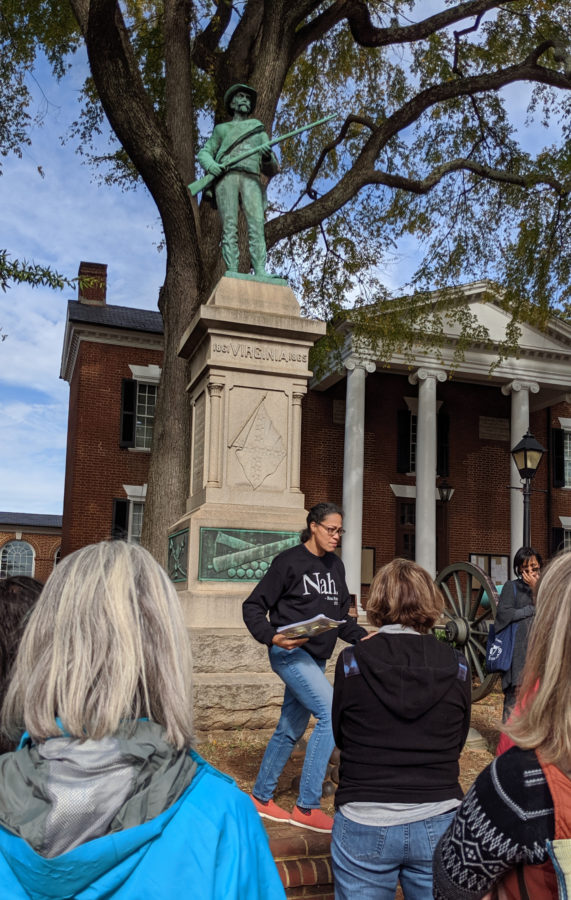 Schmidt leading a walking tour of Charlottesville's Confederate monuments with Andrea Douglas (r), Executive Director of the Jefferson School African American Heritage Center. Photo: Ashley Duffalo