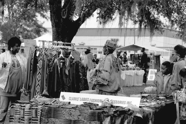 Clarks Ladies Fashions clothing display at Zora Neale Hurston Festival- Eatonville, Florida (1991) via Florida Memory: State Library and Archives of Florida, Folk Life Collection